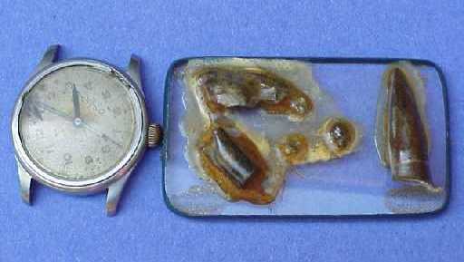 Private Hill's watch and bullet